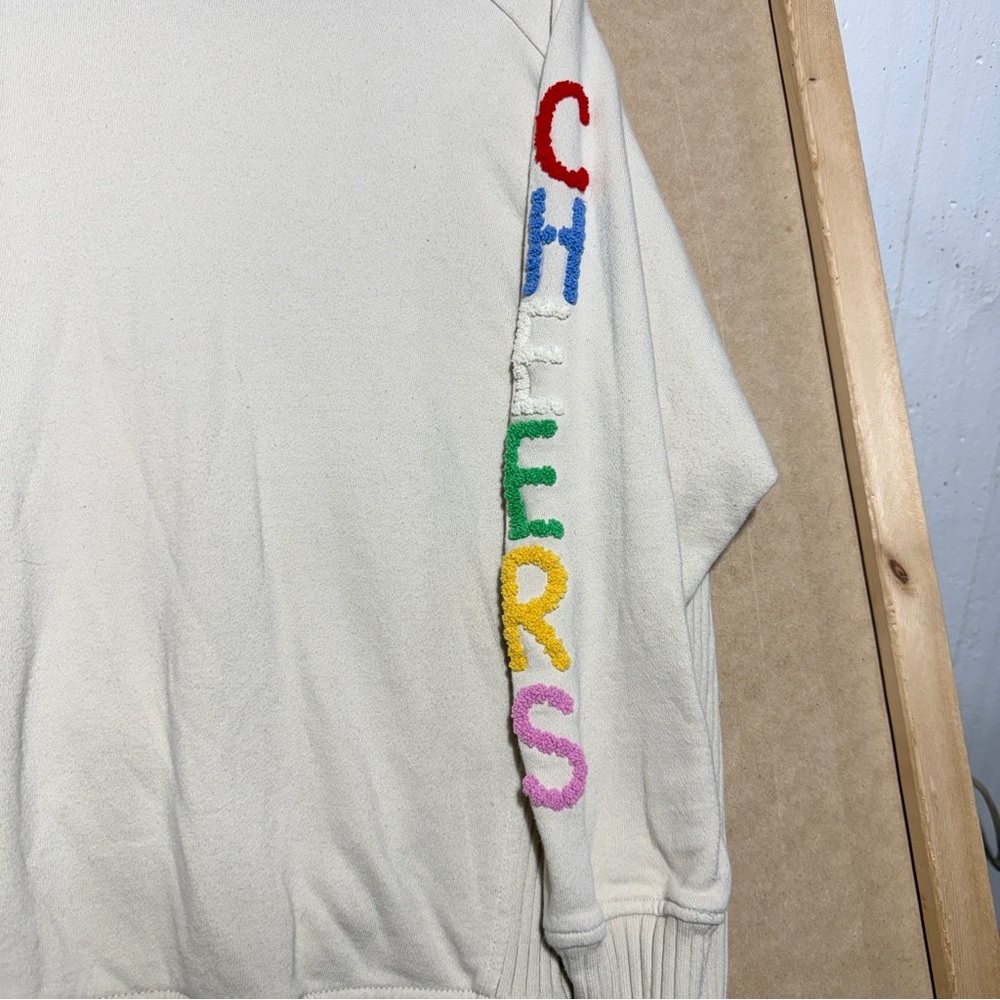 Aerie Cream Pullover Sweatshirt with Colorful 'CHEERS' Sleeve XS